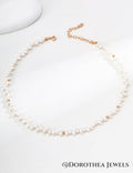 Delicate Rice Pearl Station Necklace with Gold Bead Accents - DOROTHEA JEWELS