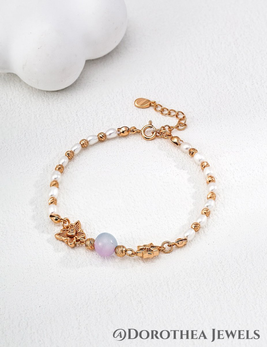 Enchanted Glow: Cat's Eye & Natural Pearl Butterfly Bracelet - DOROTHEA JEWELS