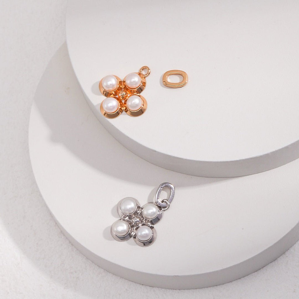 Four - Petal Natural Pearl Flower Charm in S925 Silver - DOROTHEA JEWELS