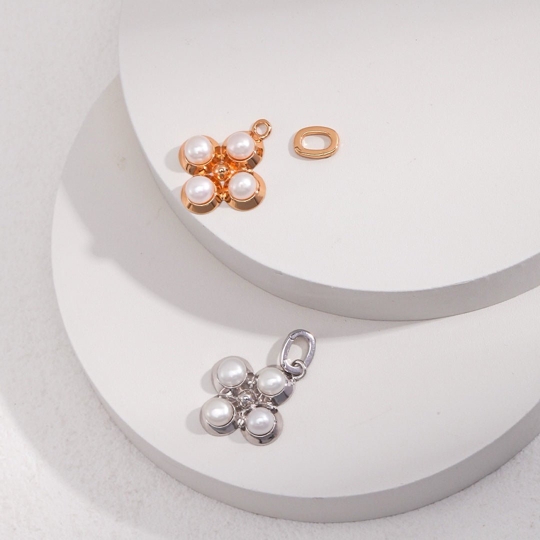 Four - Petal Natural Pearl Flower Charm in S925 Silver - DOROTHEA JEWELS