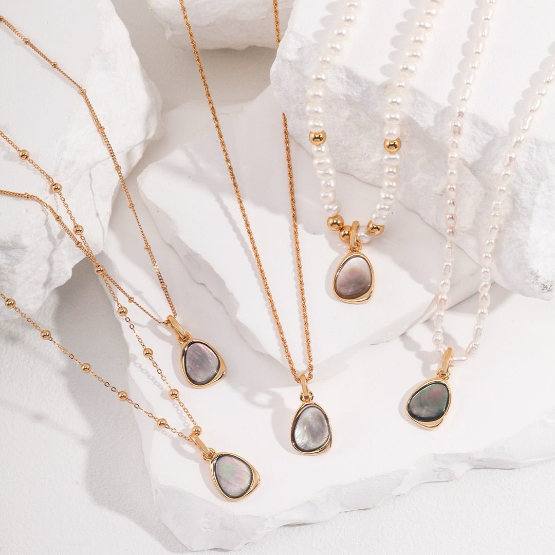 Iridescent Black Mother of Pearl Teardrop Charm in S925 Silver - DOROTHEA JEWELS