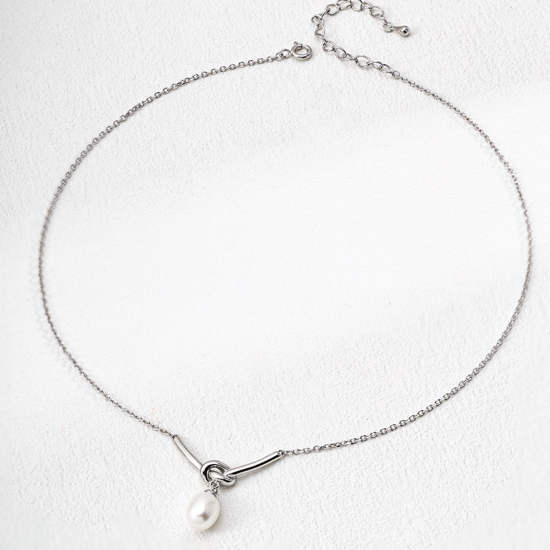 Sterling Silver Love Knot Natural Pearl Necklace - DOROTHEA JEWELS